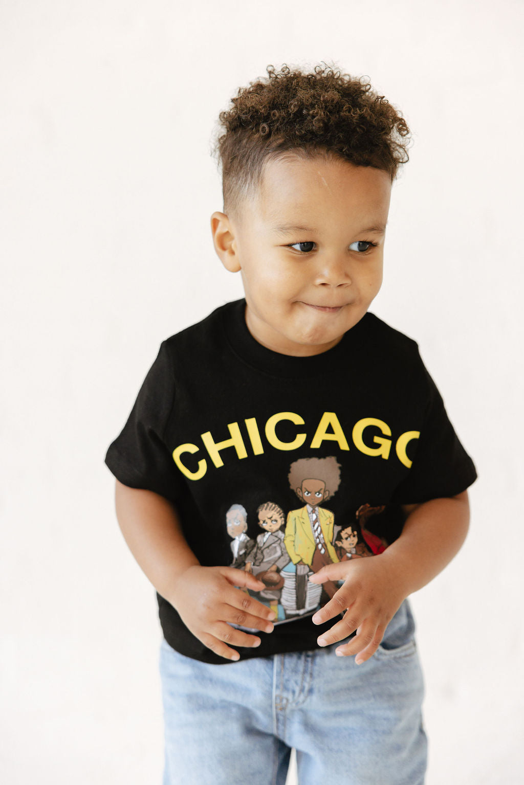 Young Child wearing a Chicago Morning Black tee