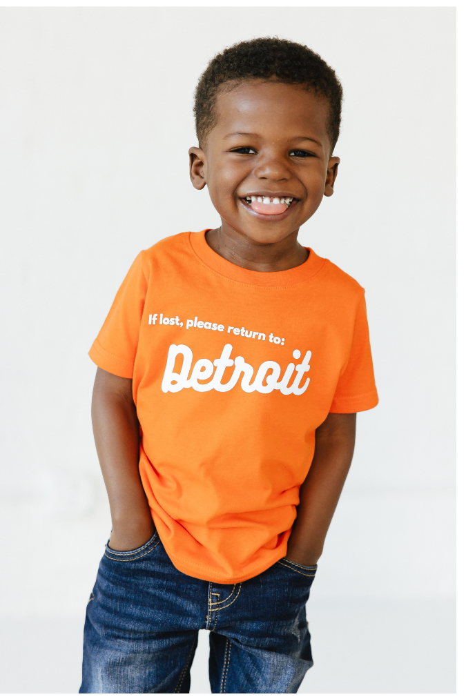 Boy wearing Orange Tee