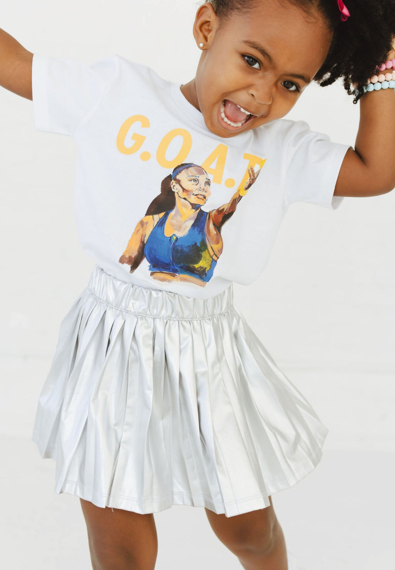 Child wearing GOAT Serena Tee