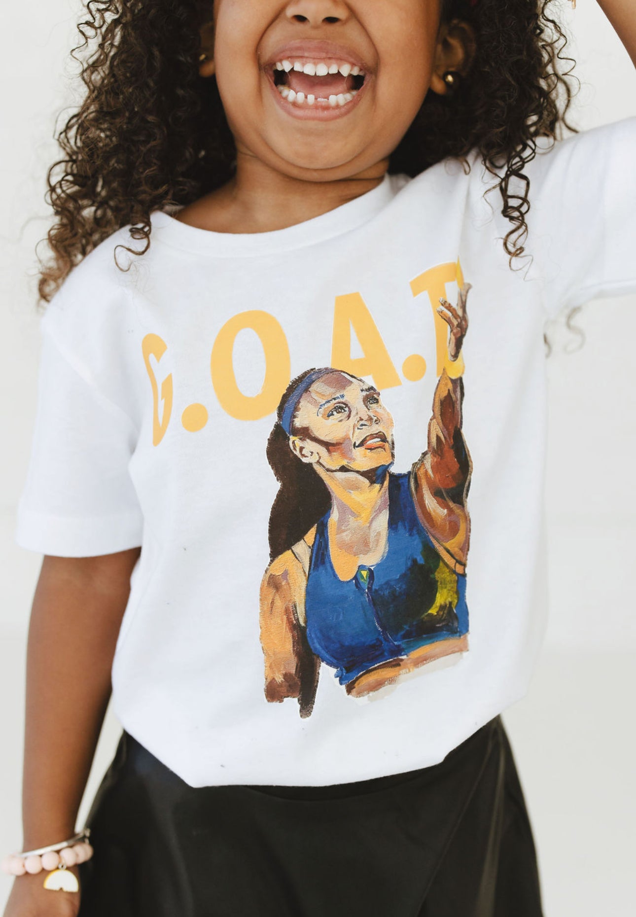 Child wearing GOAT Serena Tee