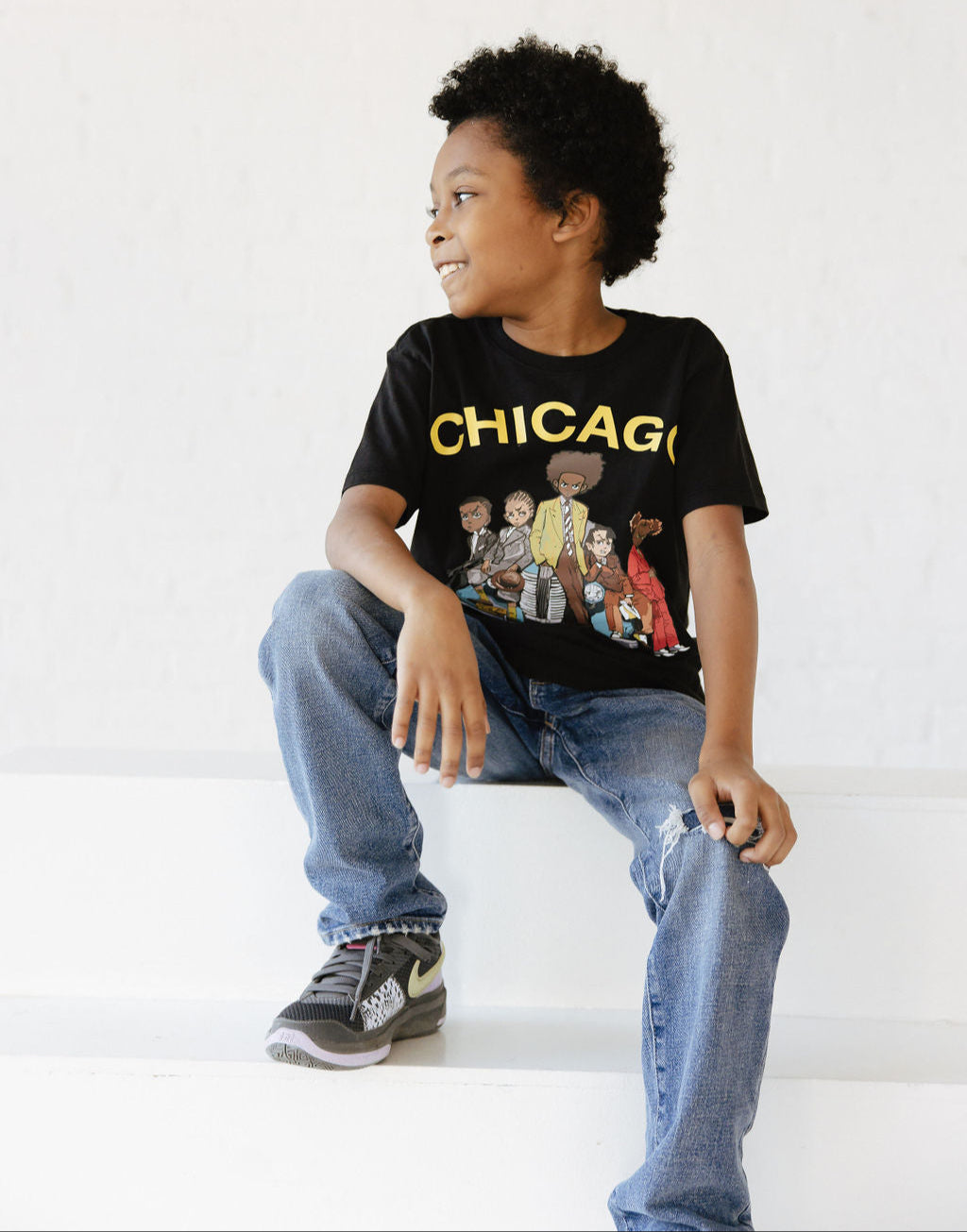 Boy wearing Black Chicago Morning Tee