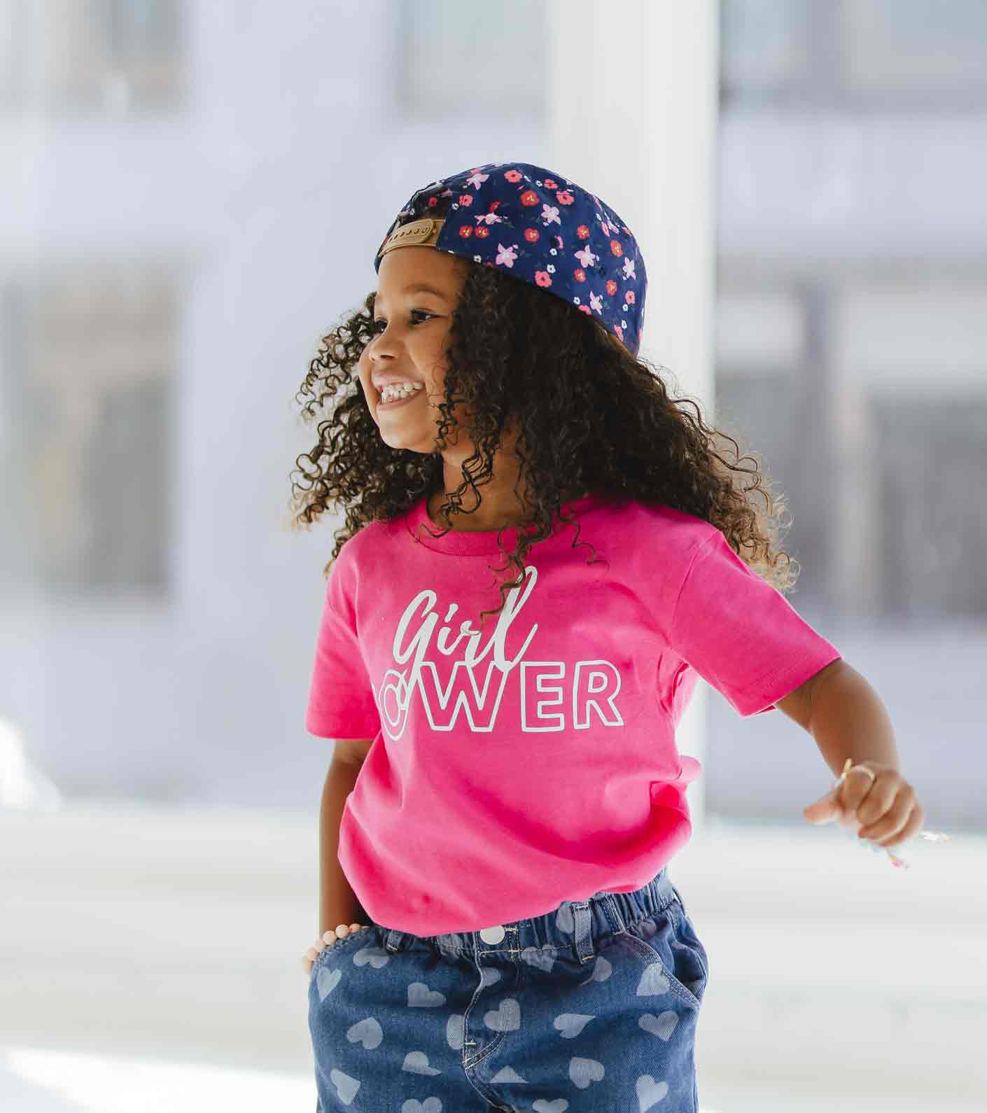 Child wearing Pink Girl Power Tee