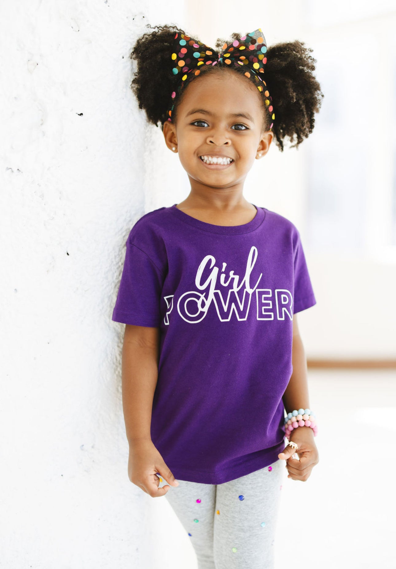 Girl wearing Purple Girl Power Tee White Lettering