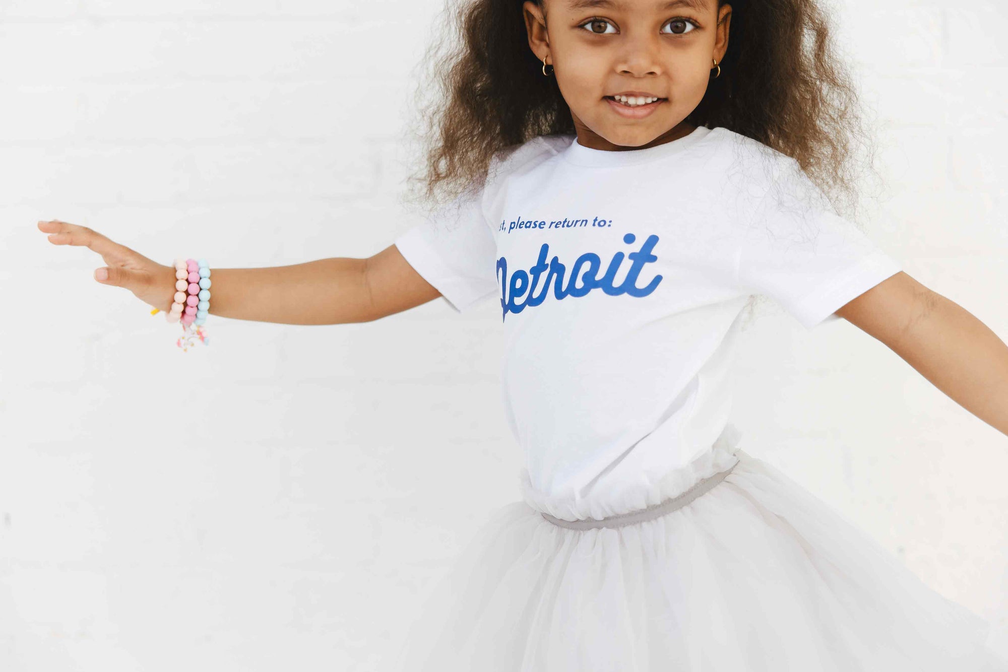 Graphic Tee - Girl wearing Detroit Tee