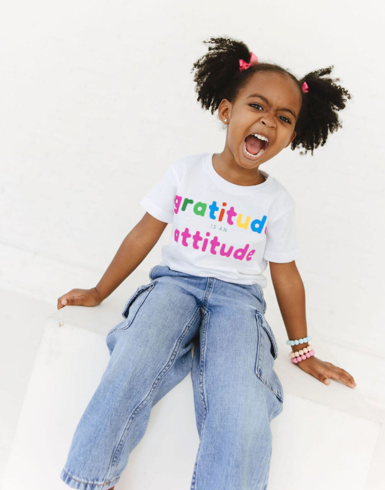 Graphic Tee - Girl wearing Gratitude is Attitude tee