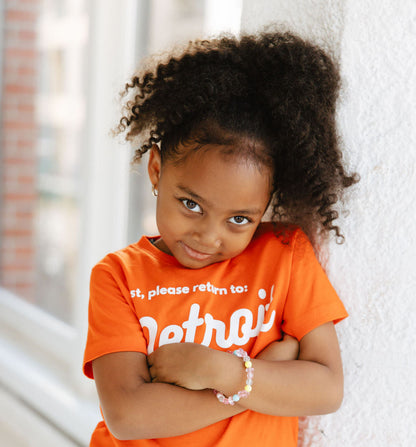 Graphic Tee - Girl wearing Detroit Tee Orange