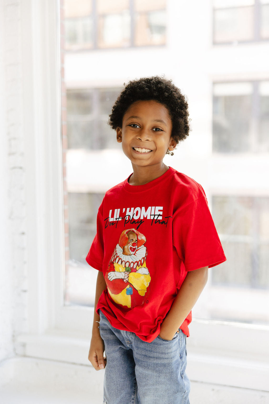 Boy wearing Red Lil Homie Tee