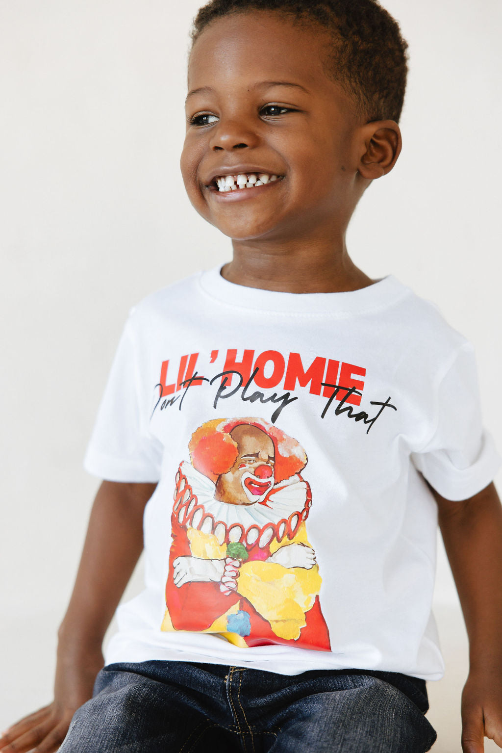 Boy wearing L'il Homie White Tee