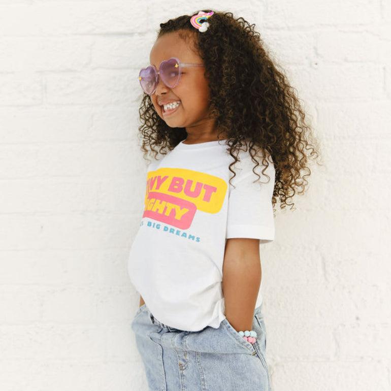 Child Wearing Tiny but Mighty White Tee